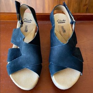 Clark’s wedge style sandals
